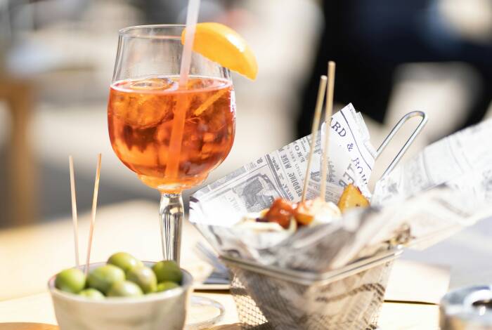 Aperol and snacks in Rome | Unsplash: Dennis Schmidt