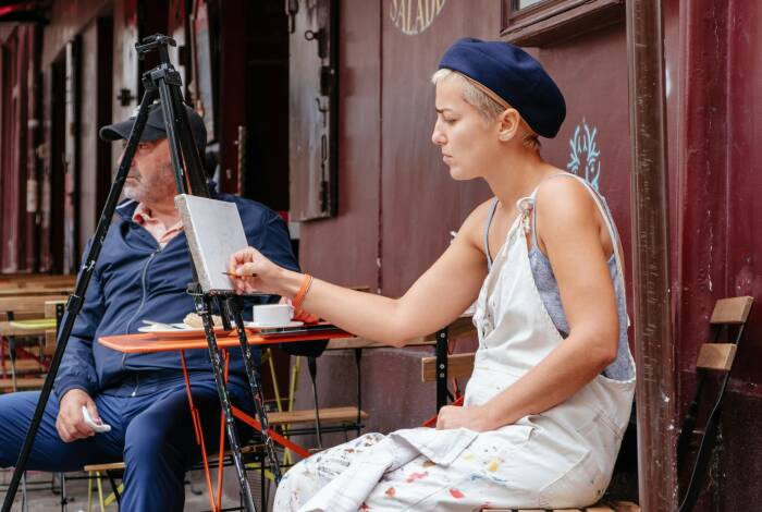 Artista a Place de Tertre | Unsplash: Johan Mouchet