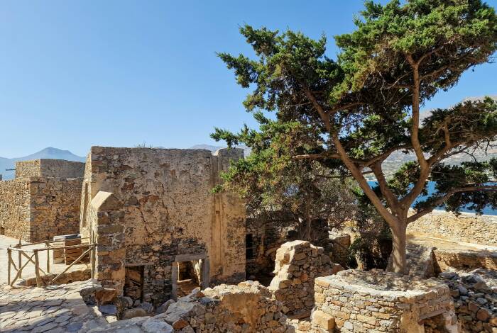 Häuser auf Spinalonga | Unsplash: Martijn Vonk